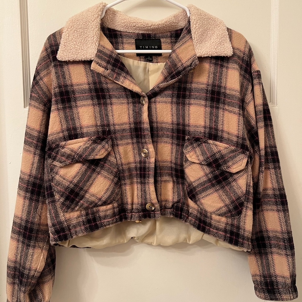 Brown jacket with fur/rugged collar
